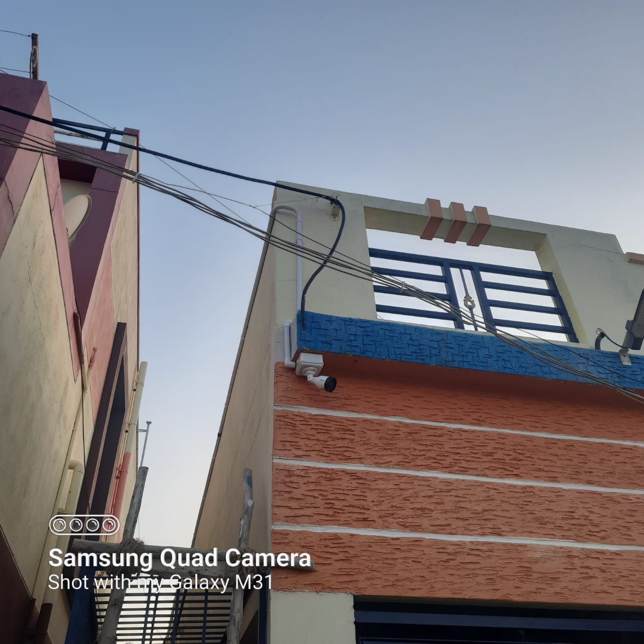 Residential CCTV — corner-mounted bullet camera