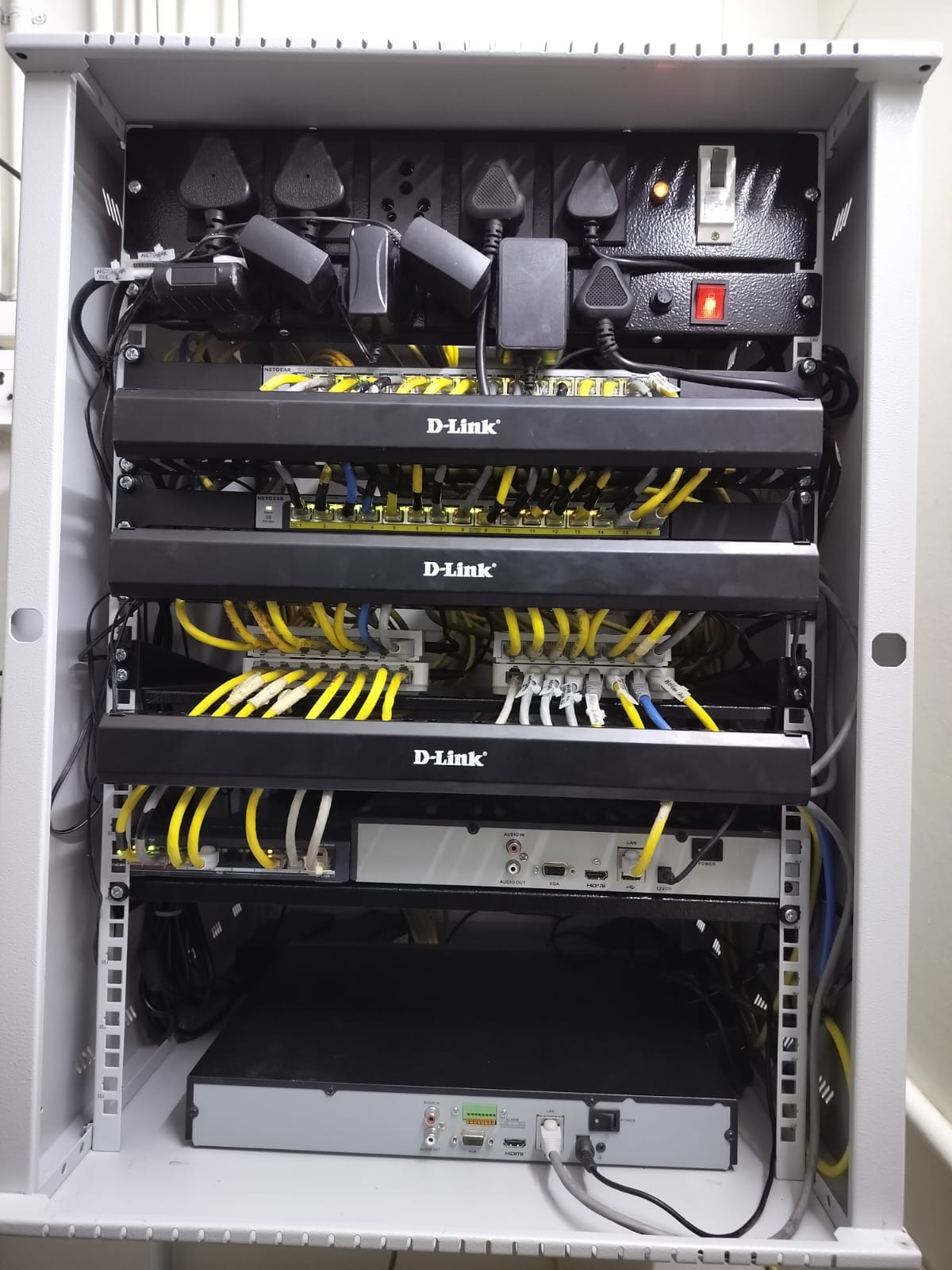 Professional D-Link rack — switches, patch panels and NVR installed by SL Security